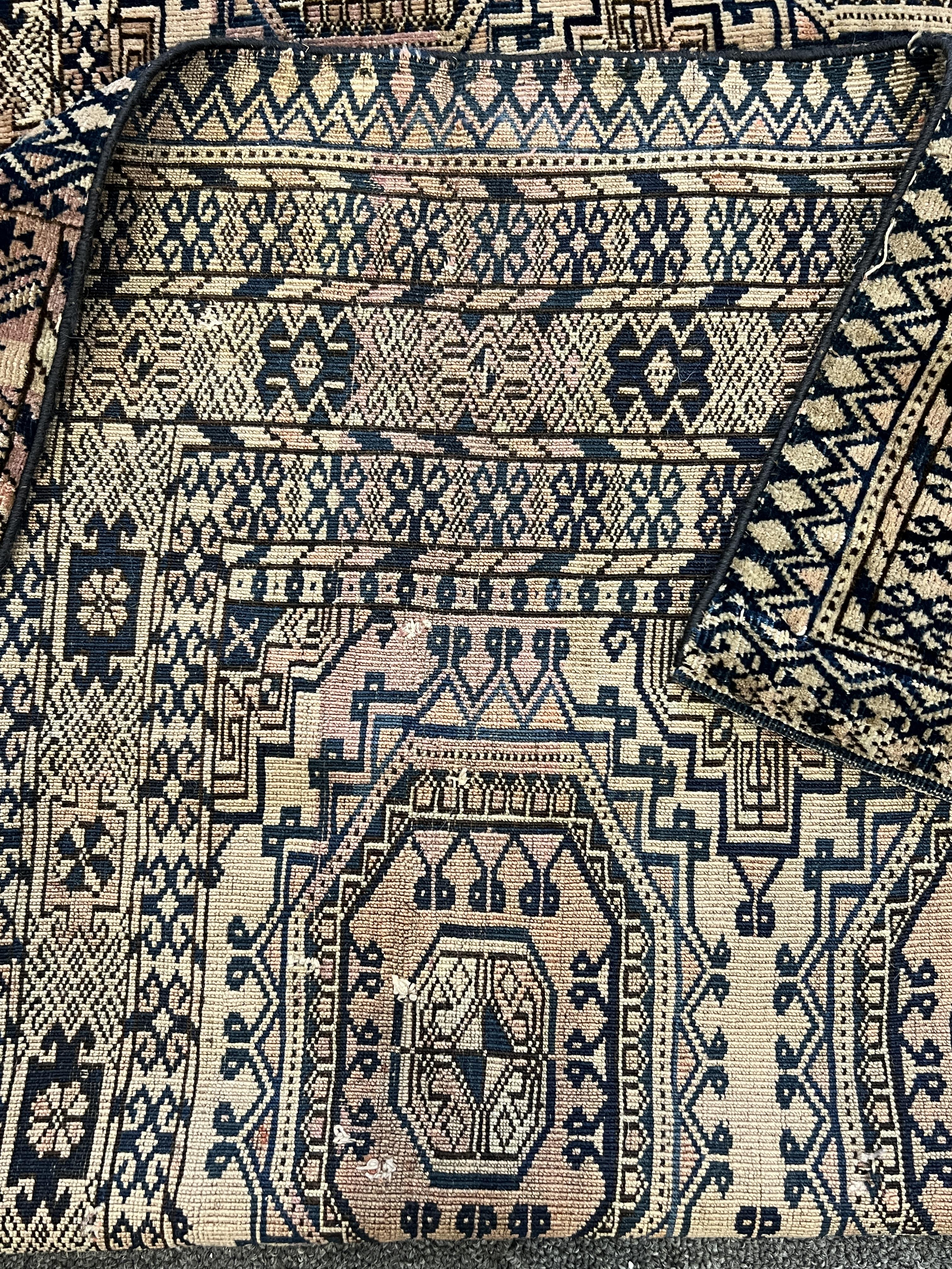 Two Afghan rugs / saddlebags, larger 104 x 108cm. Condition - fair